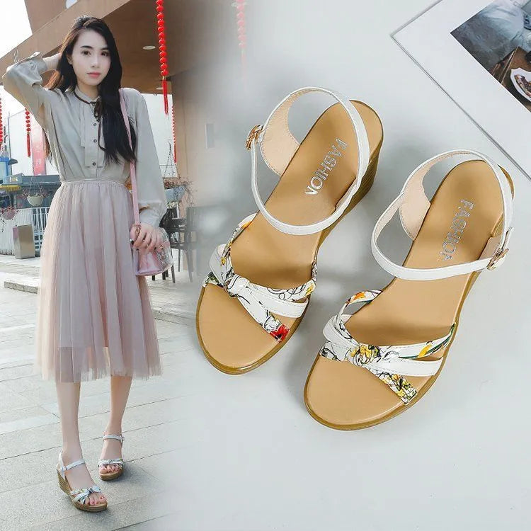 Pink women's wedge sandals with a fish mouth open toe and a thick non-slip heel.