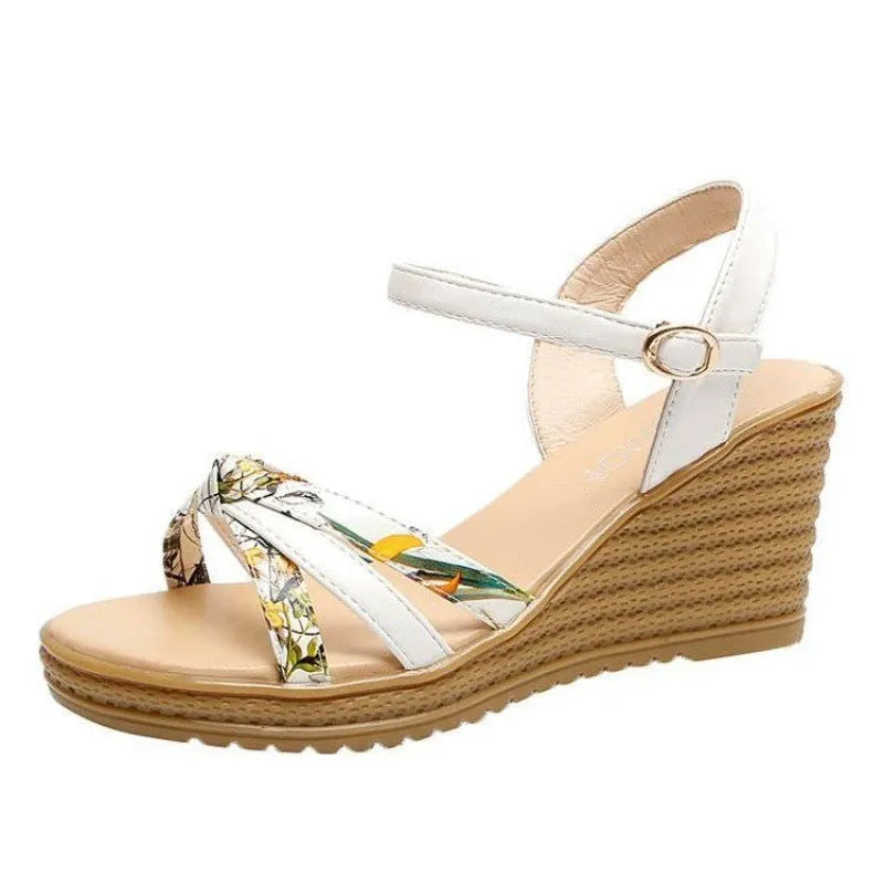Pink women's wedge sandals with a fish mouth open toe and a thick non-slip heel.