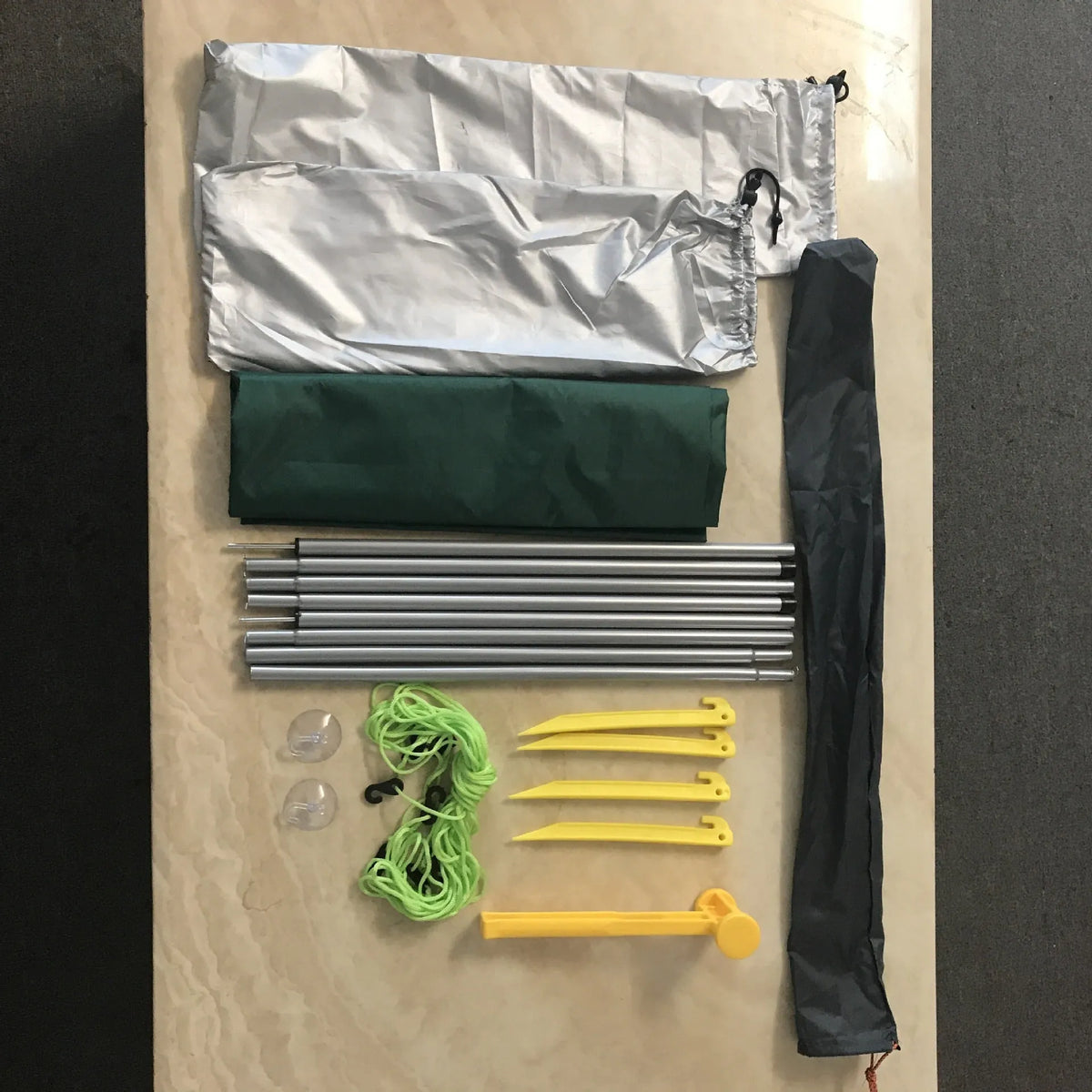 Green unity car side awning set up beside vehicle, 2.8m long 1.8m wide aluminium pole structure