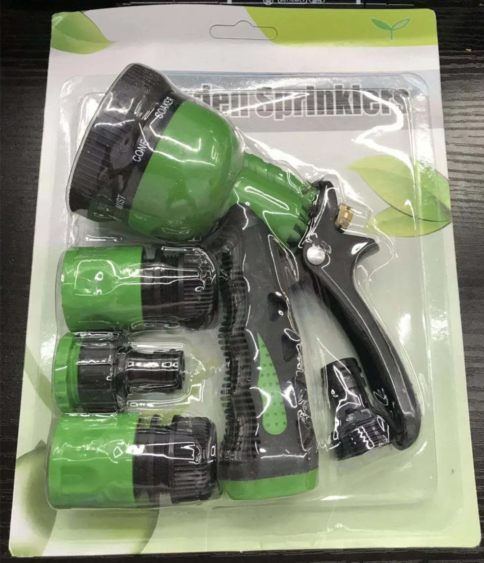 Green metal garden spray gun with sprinkler attachment for watering and cleaning