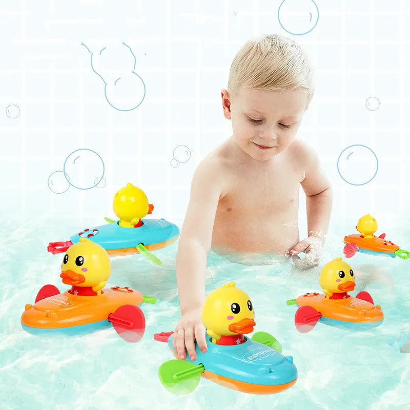 Yellow plastic wind-up swimming bath toy for children's interactive water play