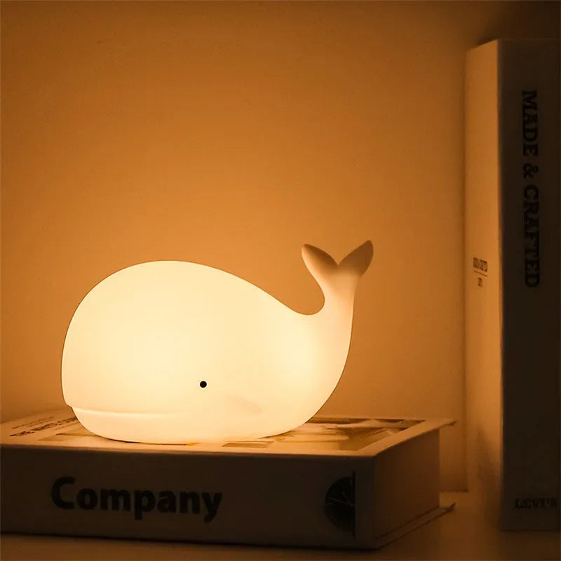 White dolphin night light with 7 colour effects, rechargeable 800mAh battery, Micro USB charging, tap control.