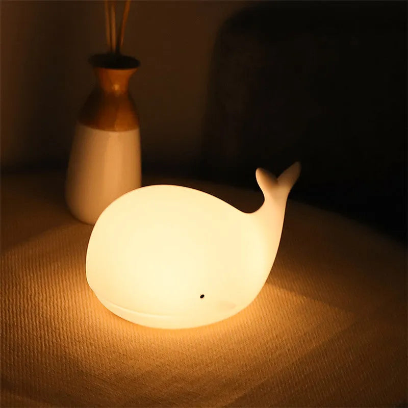 White dolphin night light with 7 colour effects, rechargeable 800mAh battery, Micro USB charging, tap control.