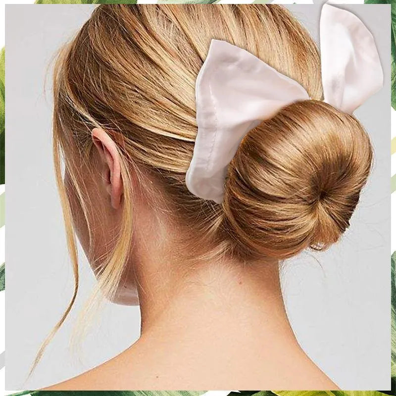 A cotton ladies headband with a French retro bowknot style, shown in a green colour.