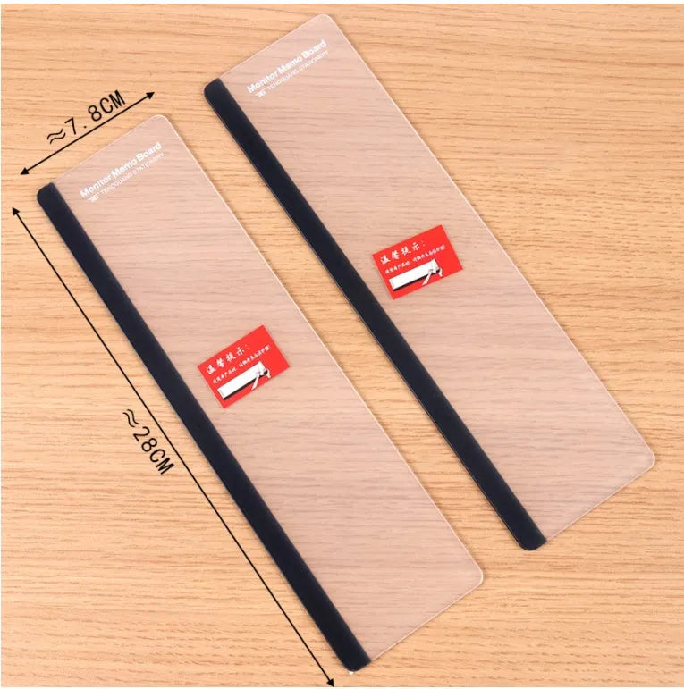 Transparent acrylic computer monitor side pane 28 by 7.8cm attached to screen showing notes