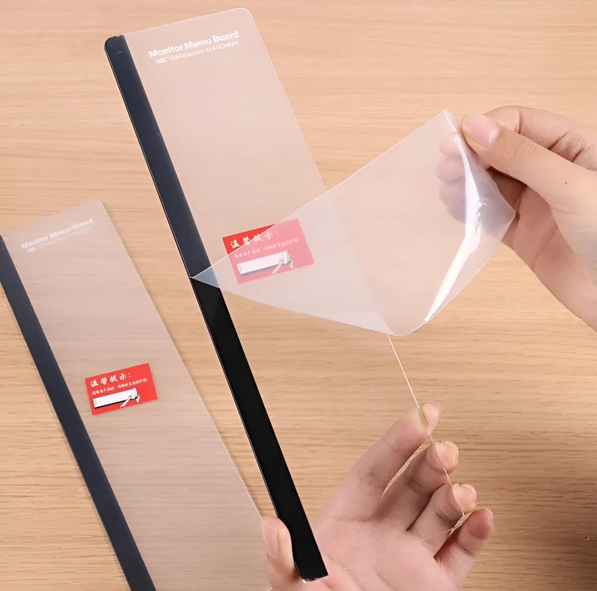Transparent acrylic computer monitor side pane 28 by 7.8cm attached to screen showing notes