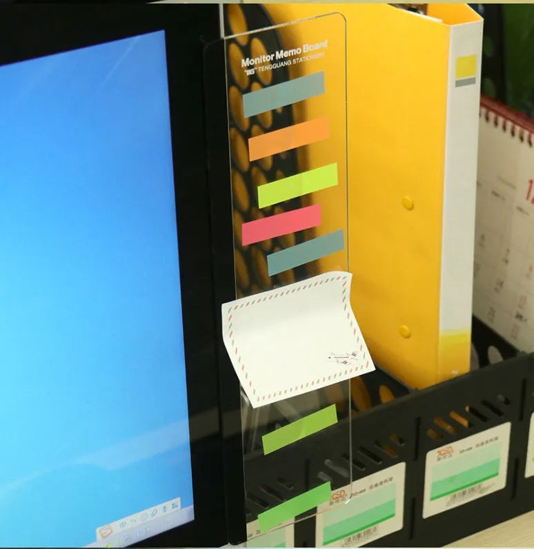 Transparent acrylic computer monitor side pane 28 by 7.8cm attached to screen showing notes