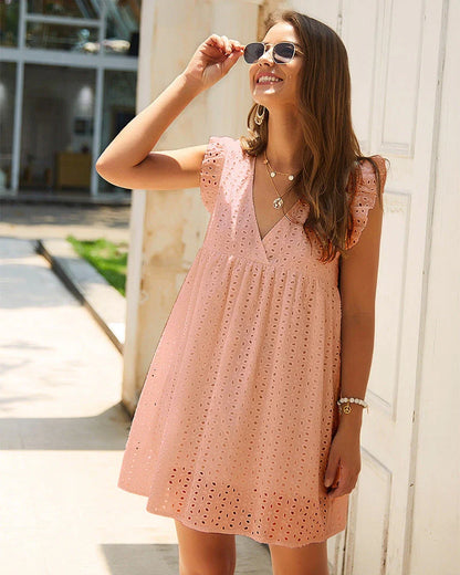 Chic Breezy Cotton Mini Dress with V-Neck, a versatile and comfortable summer fashion item