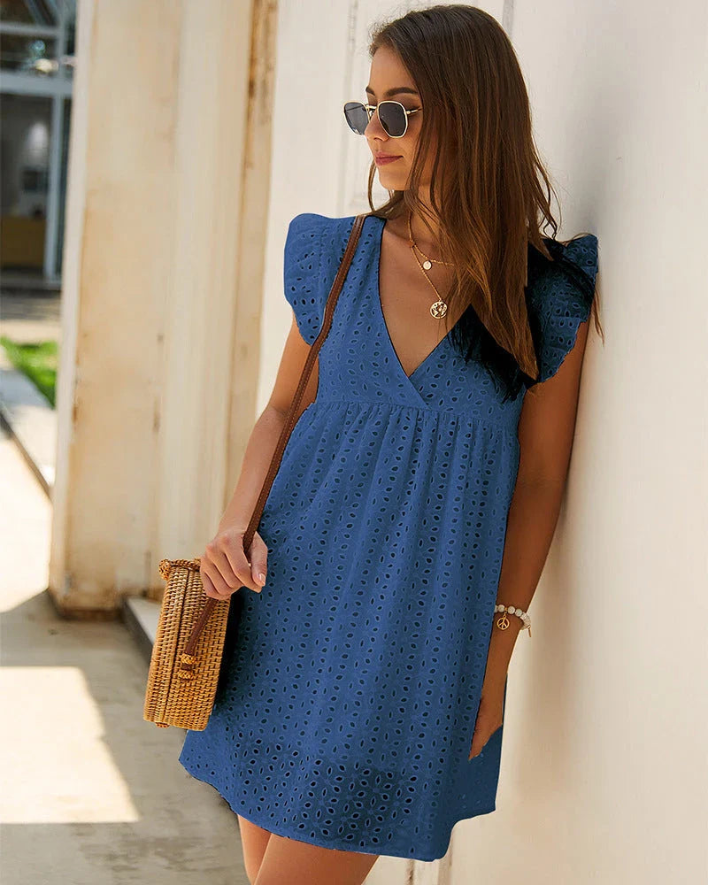 Chic Breezy Cotton Mini Dress with V-Neck, a versatile and comfortable summer fashion item