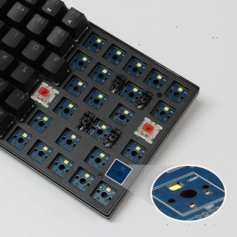 84-key three-mode mechanical keyboard with white backlighting in black or white case with hot-swappable switches