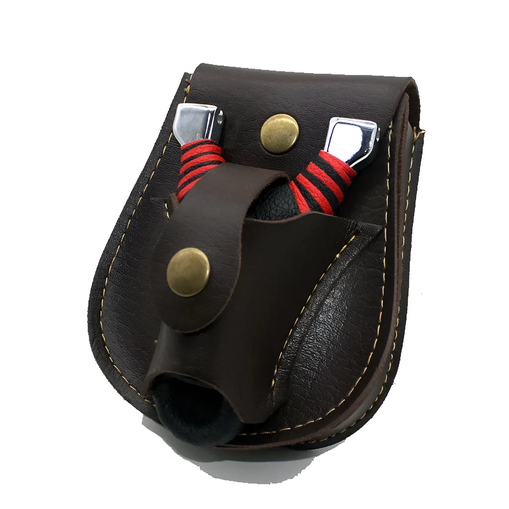 Leather slingshot belt bag in black, holding steel balls, attached to a belt for outdoor carry.