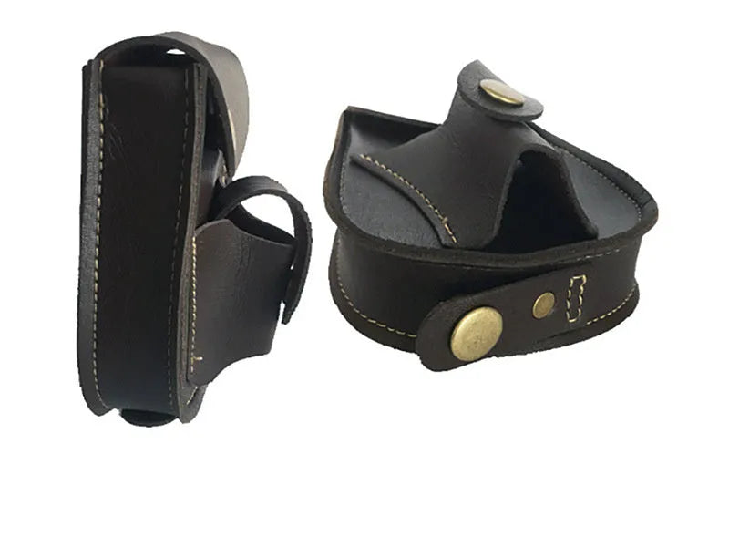 Leather slingshot belt bag in black, holding steel balls, attached to a belt for outdoor carry.
