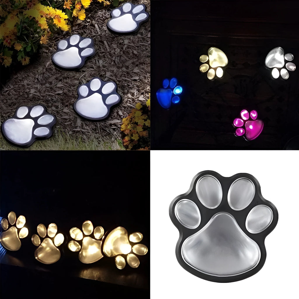 Black solar-powered bear paw-shaped garden light with ground stake and solar panel.