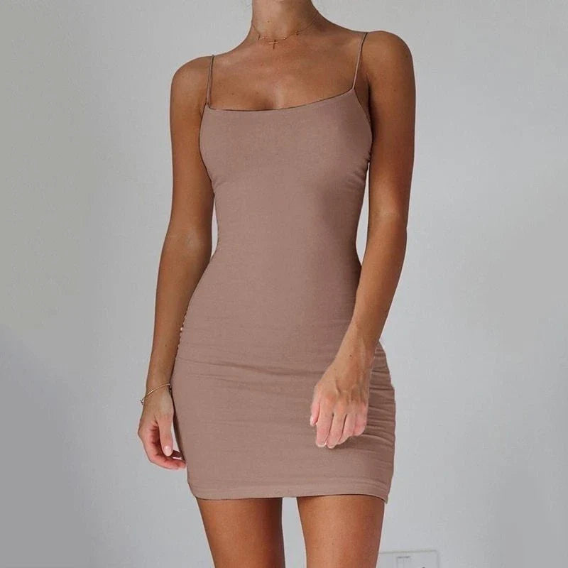 Stylish spaghetti strap mini dress in various colors, featuring a figure-hugging fit and contemporary design