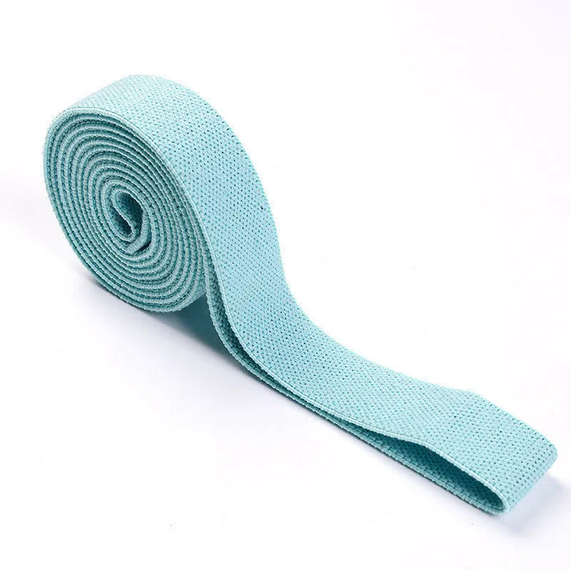 2-metre long elastic yoga stretch band in pink, purple, and black with storage mesh bag