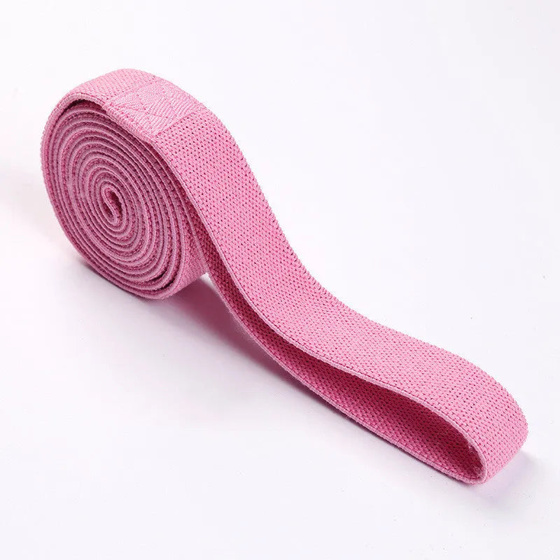 2-metre long elastic yoga stretch band in pink, purple, and black with storage mesh bag
