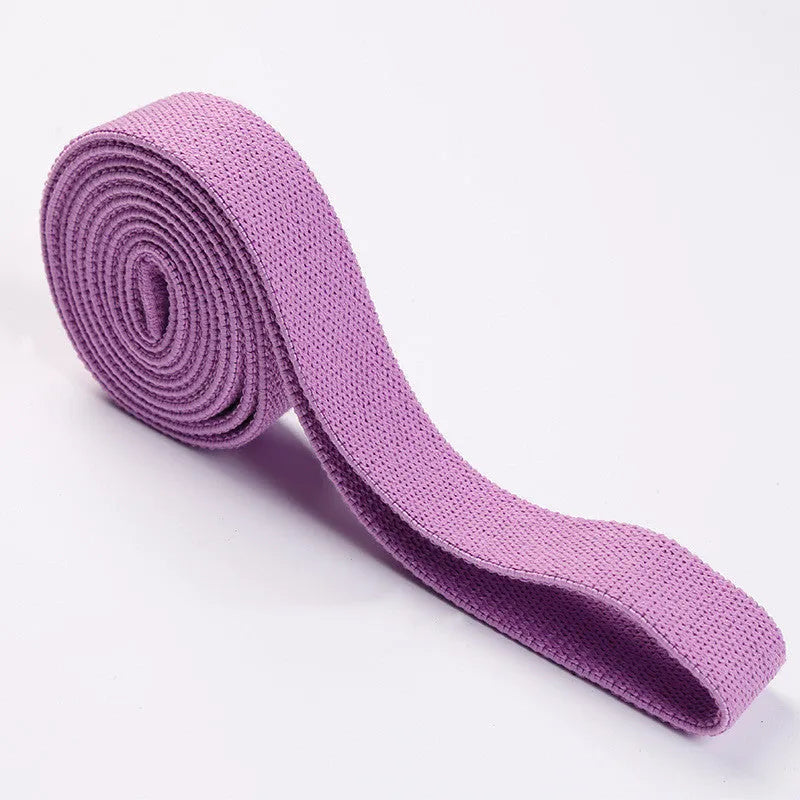 2-metre long elastic yoga stretch band in pink, purple, and black with storage mesh bag