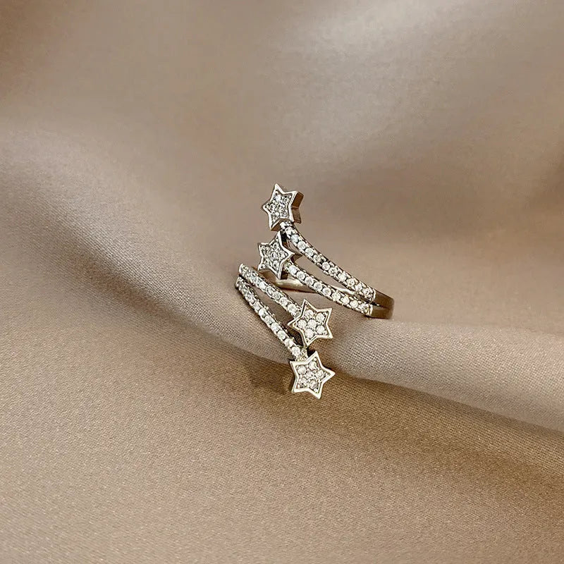 Multi-layer micro-inlaid five-pointed star zircon ring in silver, adjustable copper band with gold-plated gems