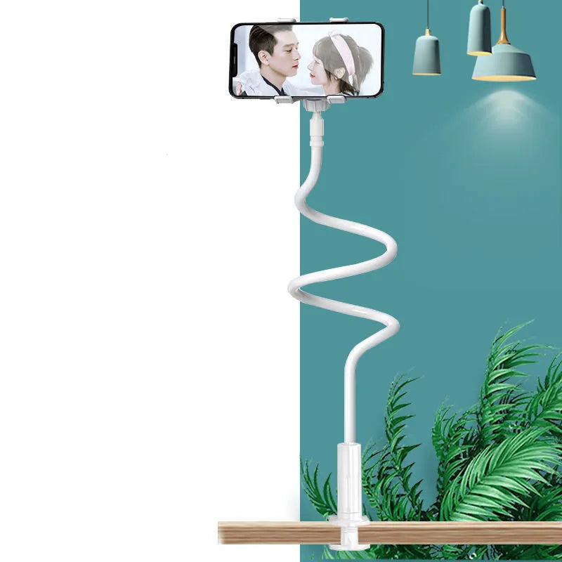 Blue memory alloy flexible hose mobile phone and tablet holder on a bedside table.