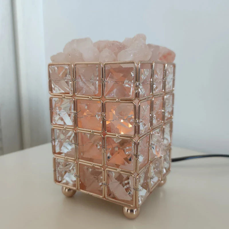 Elegant crystal salt lamp with warm, soothing glow for cozy bedroom decor and natural air purification