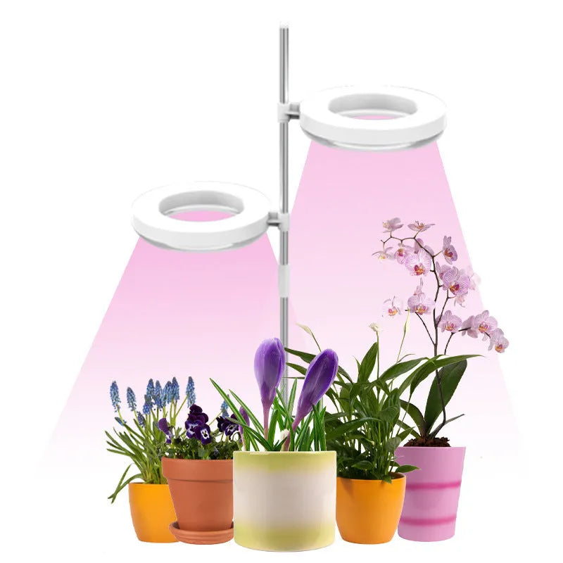 Compact white PC shell plant growth lamp with LED lights, shown on a wooden desk.