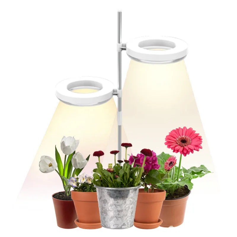 Compact white PC shell plant growth lamp with LED lights, shown on a wooden desk.