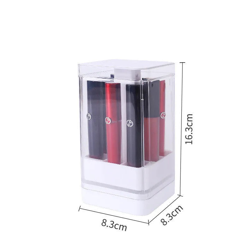 Press-to-lift lipstick storage box in pink or white on a desktop, showing 8-grid or 12-grid configuration.