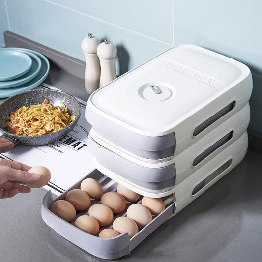 Refrigerator egg organizer with drawer-style design, breathable mesh compartments, and stackable construction for efficient fridge storage