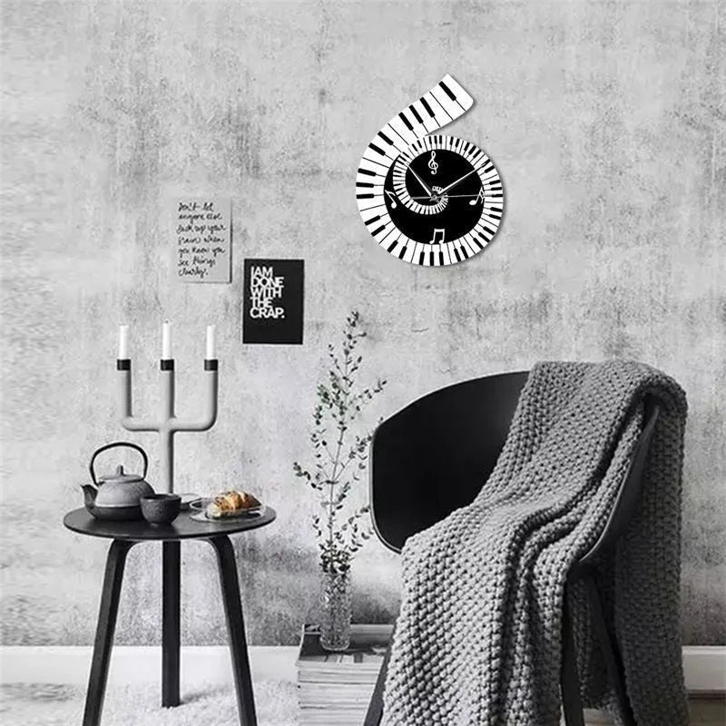 Black and white treble clef piano keyboard shaped wall clock with musical notes decoration