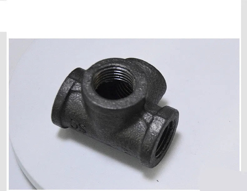 Galvanized steel four-way corner pipe fittings in three sizes with malleable iron construction