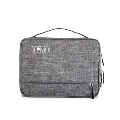 Cube-shaped polyester digital storage bag in black with zippered opening for cables and gadgets
