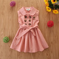 Girls sleeveless pink cotton princess A-line dress with a sash and button detail on a hanger.