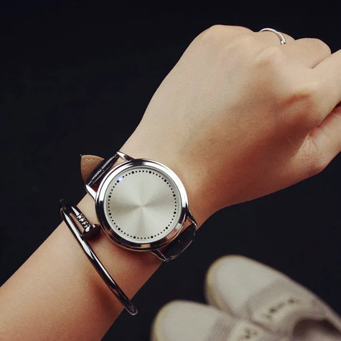 Casual electronic digital watch with blue LED display showing time in numbers