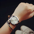 Casual electronic digital watch with blue LED display showing time in numbers