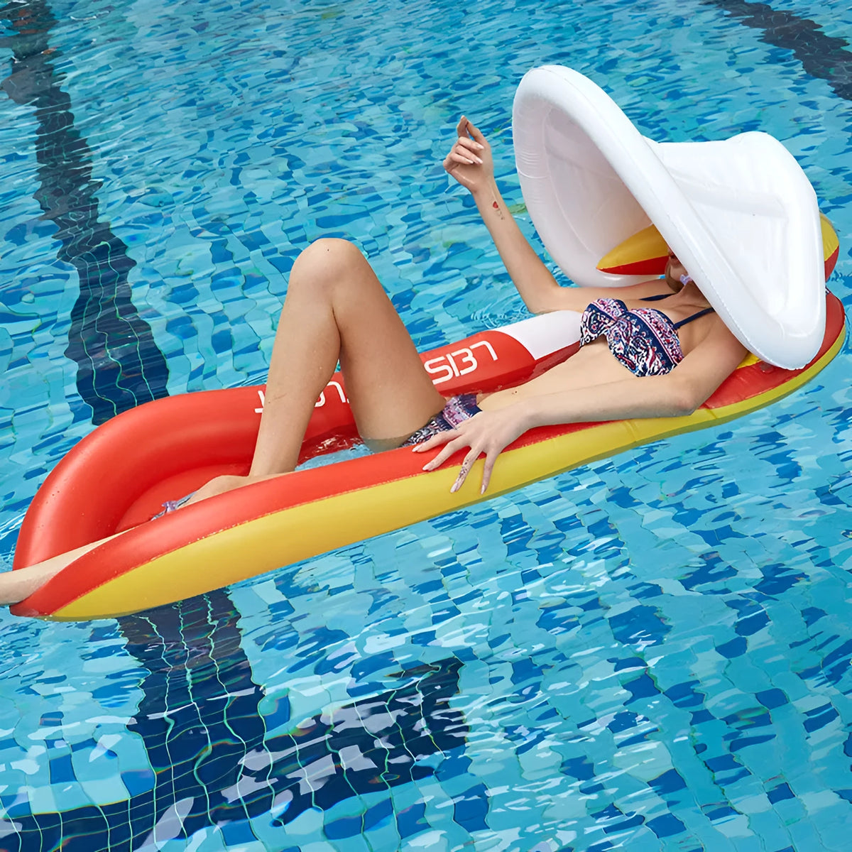 Inflatable floating bed with detachable awning, mesh seat, backrest and armrests, 160 x 84cm, blue or red