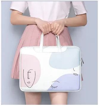 Blue waterproof laptop bag for 15.6 inch devices with soft handle and zipper closure