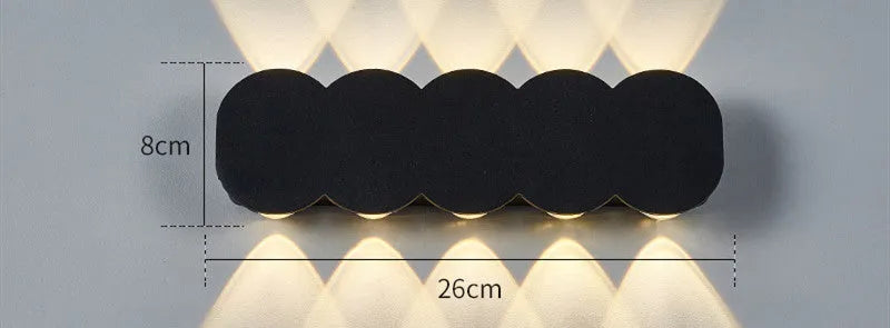 Modern minimalist waterproof LED wall light in white finish for indoor and outdoor installation