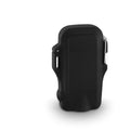 Waterproof camouflage power bank with dual USB ports and a bright LED flashlight on a rocky outdoor surface.