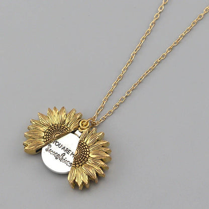 A stunning sunflower pendant necklace with an adjustable chain in various fashionable colors