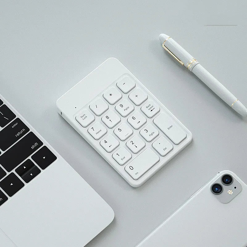 Wireless Bluetooth keyboard and mouse set in cherry blossom pink, white, or black, compatible with Apple devices.