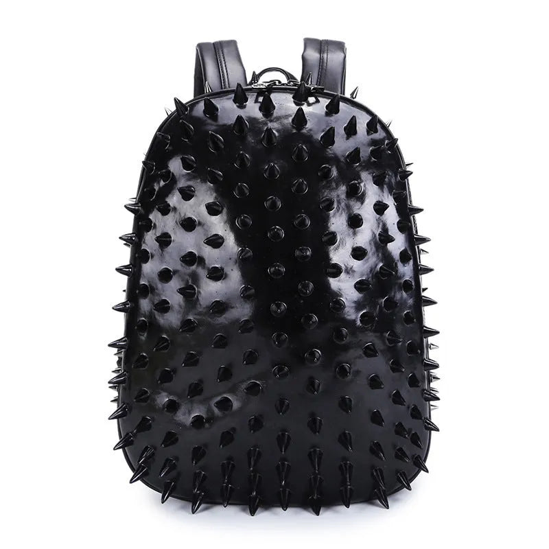 Black oval punk style backpack made of PU leather with silver zippers and air cushion shoulder straps.