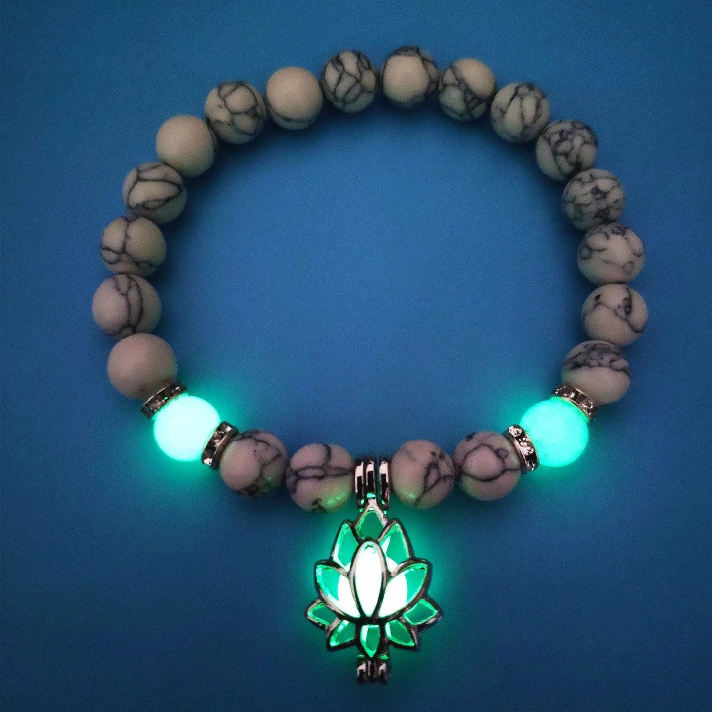 Luminous lotus charm bracelet with mesmerizing glow-in-the-dark beads, made of premium alloy and turquoise fluorescent stone