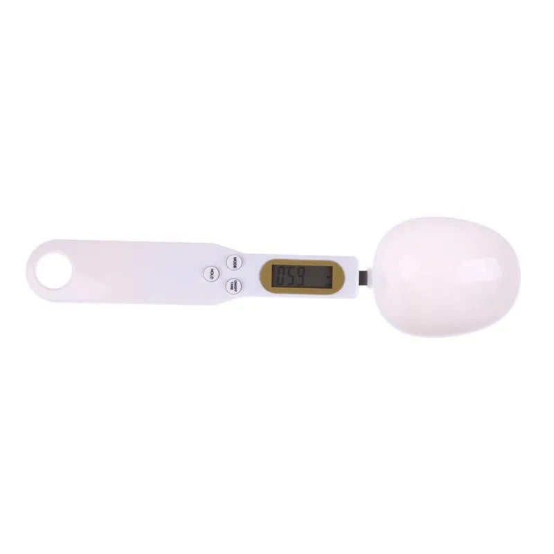 White digital spoon kitchen scale with LCD display showing weight measurement