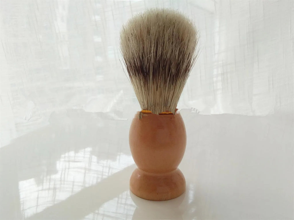 Men's manual shaving set with beech handle razor, bristle brush, stainless steel soap bowl, and metal stand