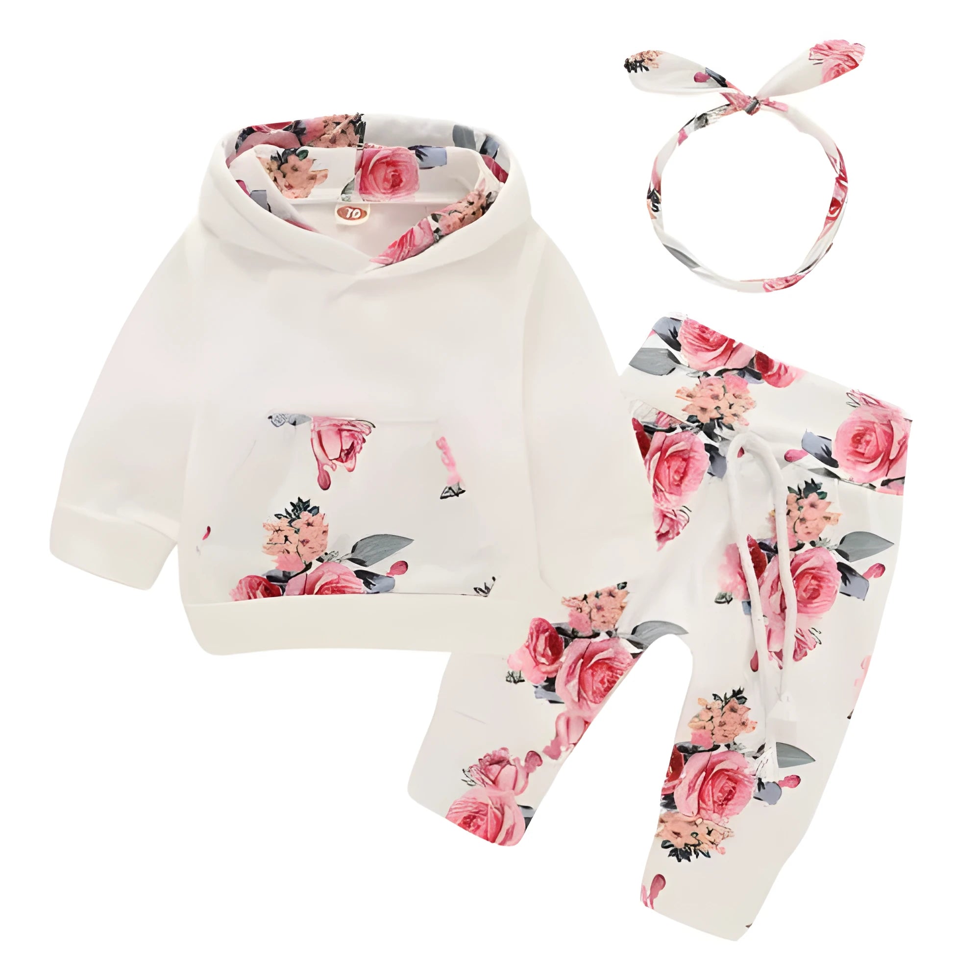 White cotton hooded tracksuit romper for a baby girl, showing long sleeves and full-length trousers.