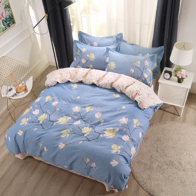 Cotton four-piece bedding set in multiple sizes with quilt cover, fitted sheet, and pillowcases