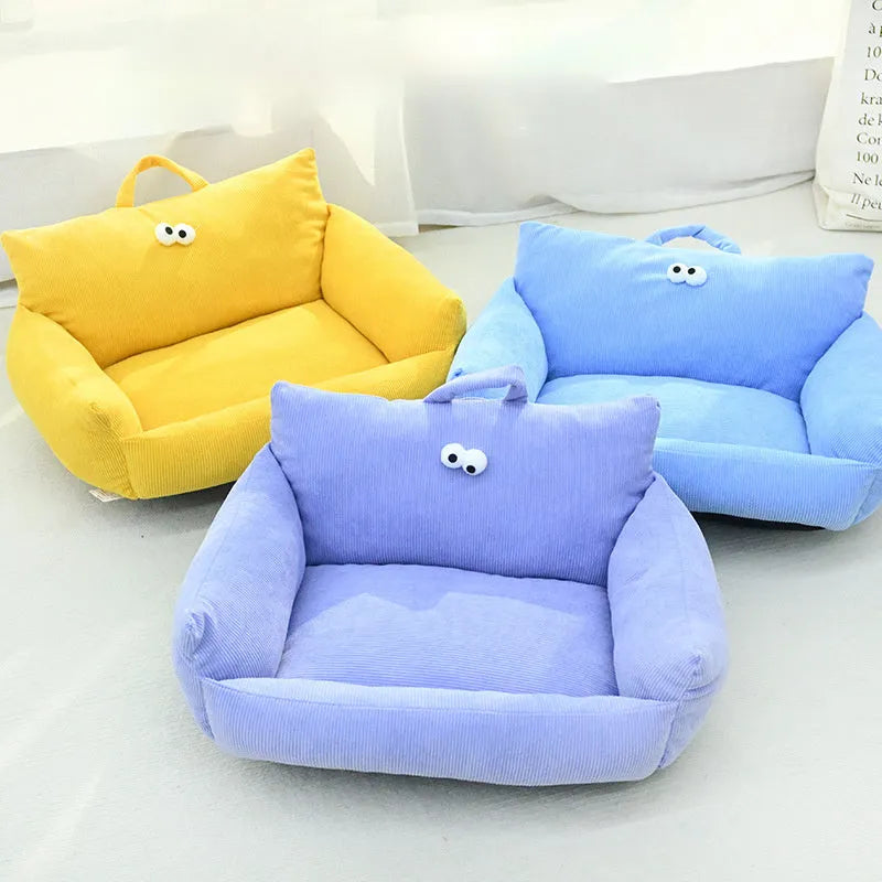 Cartoon big eyes pet bed cushion in blue colour, measuring approximately 60cm by 45cm