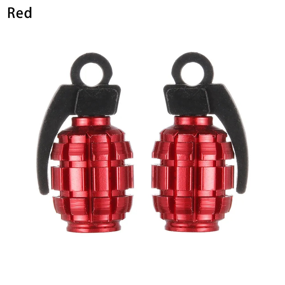 Two car tyre valve caps in red, blue, and gold colours on a white background