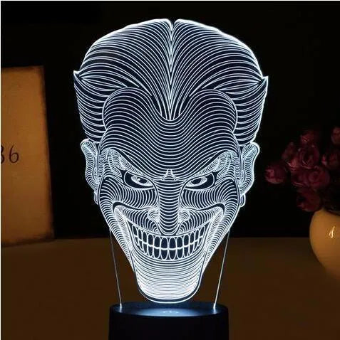 USB-powered 3D LED table lamp with remote control showing multiple colour options