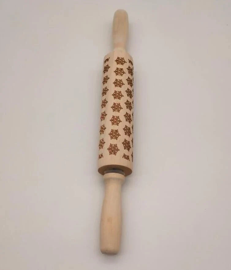 Personalized Christmas rolling pin with a variety of embossed holiday designs, including snowflakes, reindeer, and Merry Christmas patterns